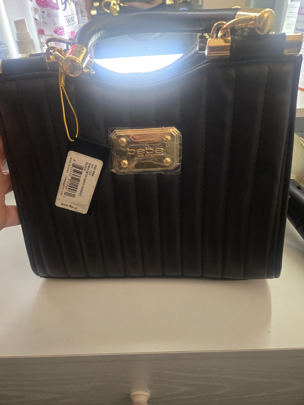 bebe Black Quilted Top-Handle Satchel with Gold Plaque Accent